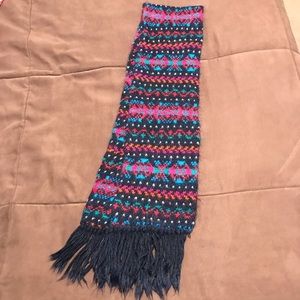 Aris warm scarf, 52” long not counting fringe.